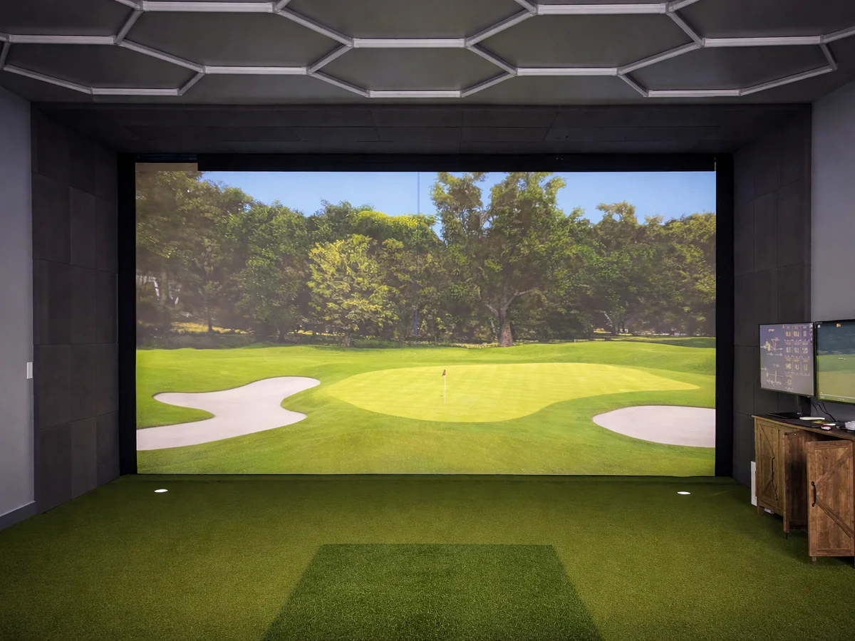 Custom built-in golf simulator in a Texas media room