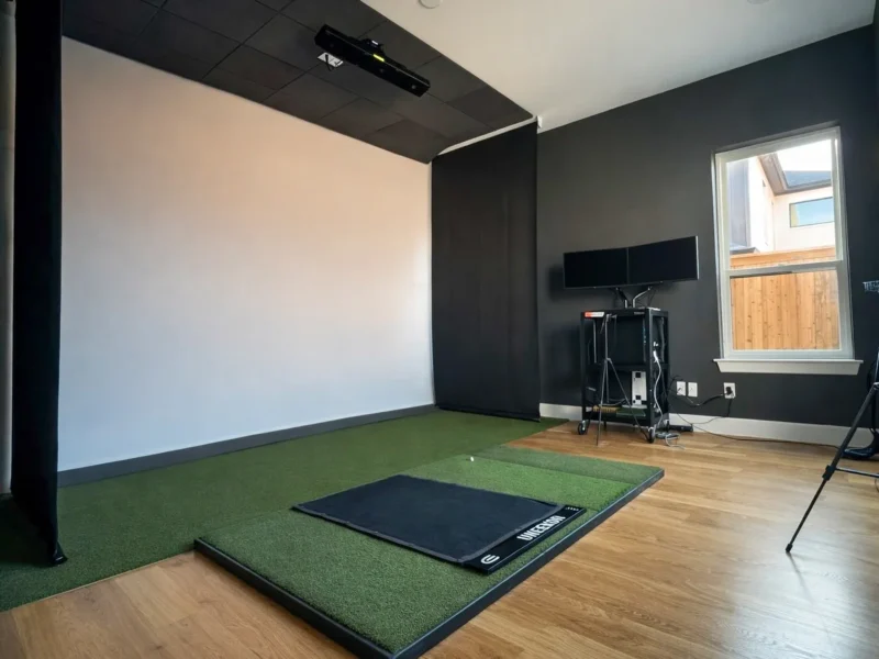 Retractable golf simulator screen installation in Texas